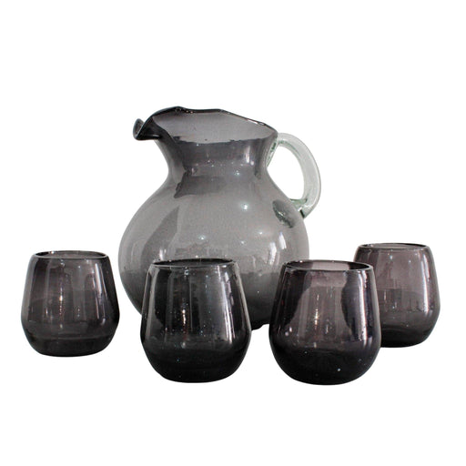 The Blown Glass Pitcher with 4 Glasses, a set of exquisitely crafted hand-blown glassware in a stunning smoky hue.