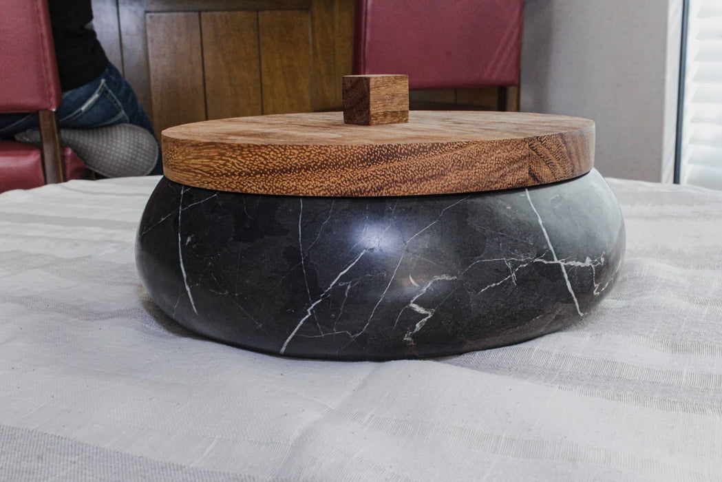 Tortillero made of black marble base and wood lid handmade in Mexico