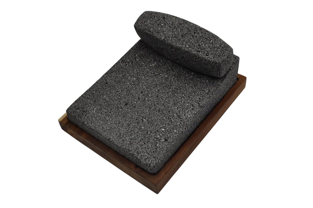 Metate with wooden base 10 x 7 Inches
