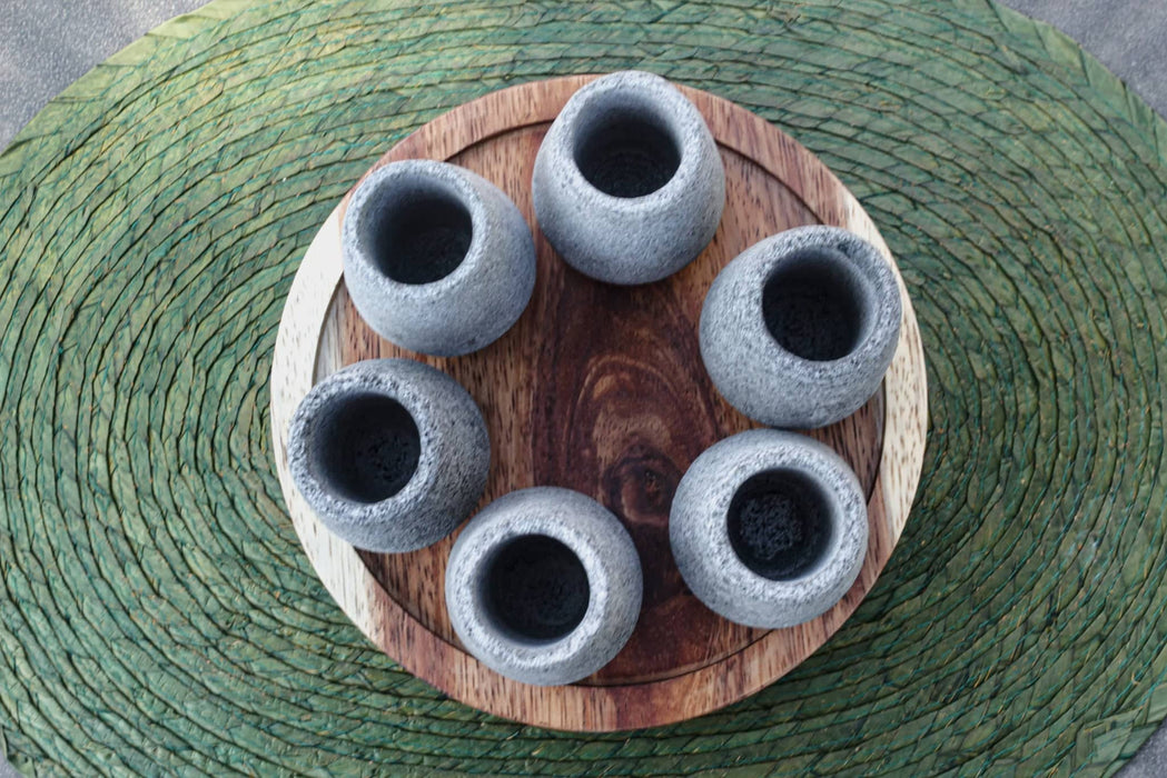 Set of 6 Tequileros shot glasses made of volcanic stone with parota wood base - CEMCUI